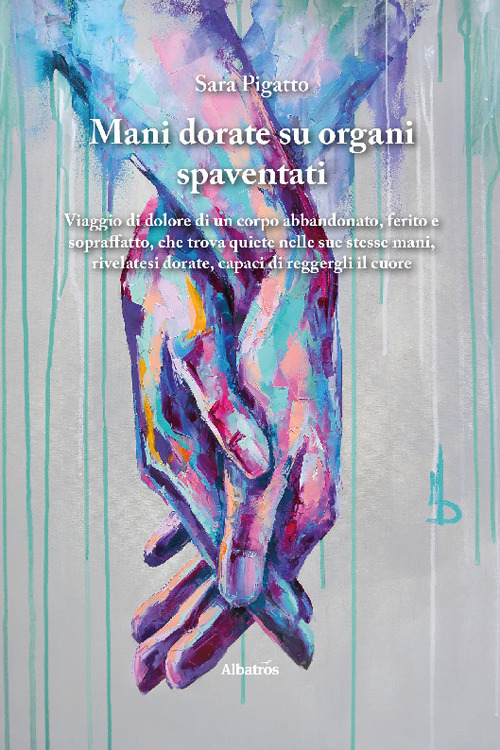 Mani dorate su organi spaventati