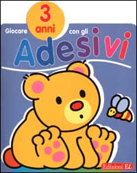 Giocare con gli adesivi. 3 anni