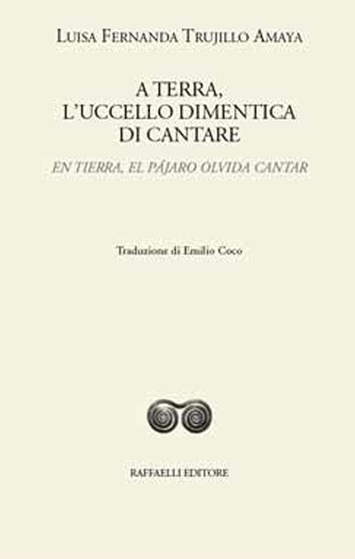 A terra, l’uccello dimentica di cantare-En tierra, el pájaro olvida cantar