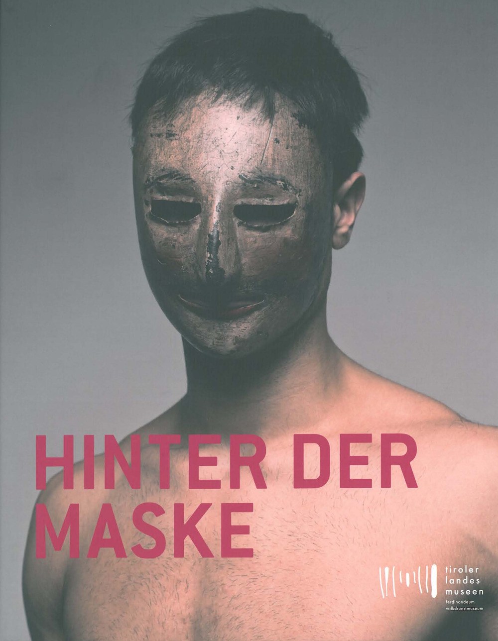 Hinter der Maske